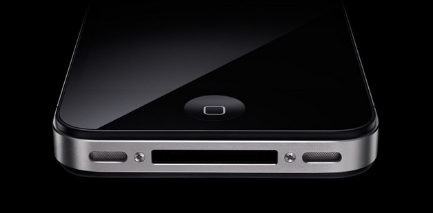 苹果iPhone 4手机底部的喇叭、麦克风和 Dock 接口特写