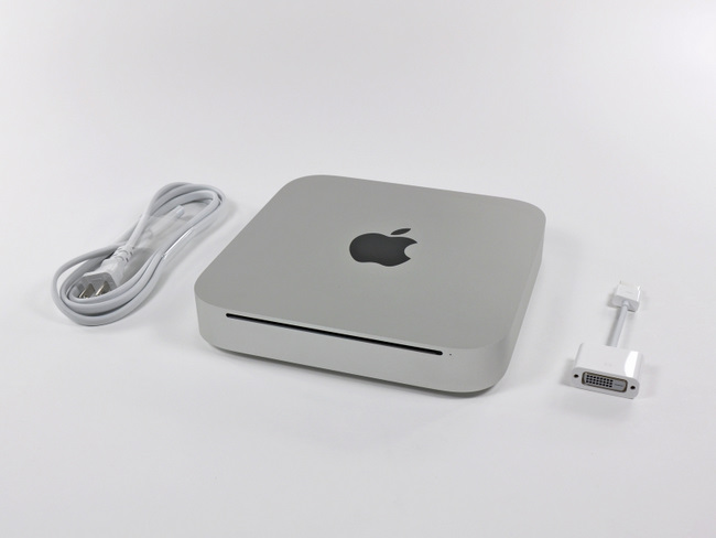 新一代苹果Mac Mini主机、电源线以及HDMI-DVI转接线
